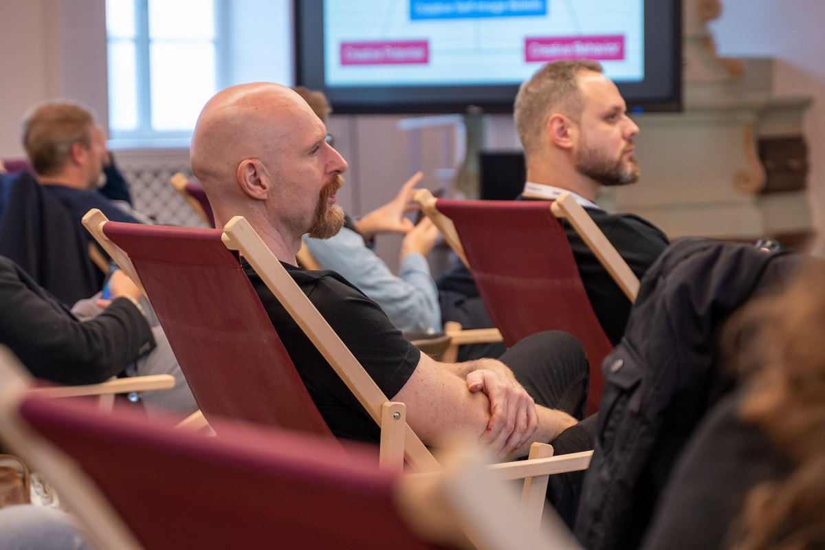 Participants listening from deckchairs during a 2021 Sonophilia Creative Leadership Forum session.